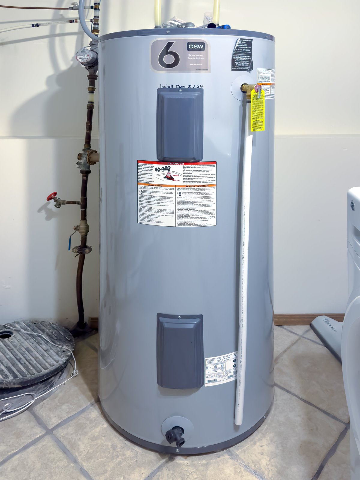 Professional water heater installation in residential home