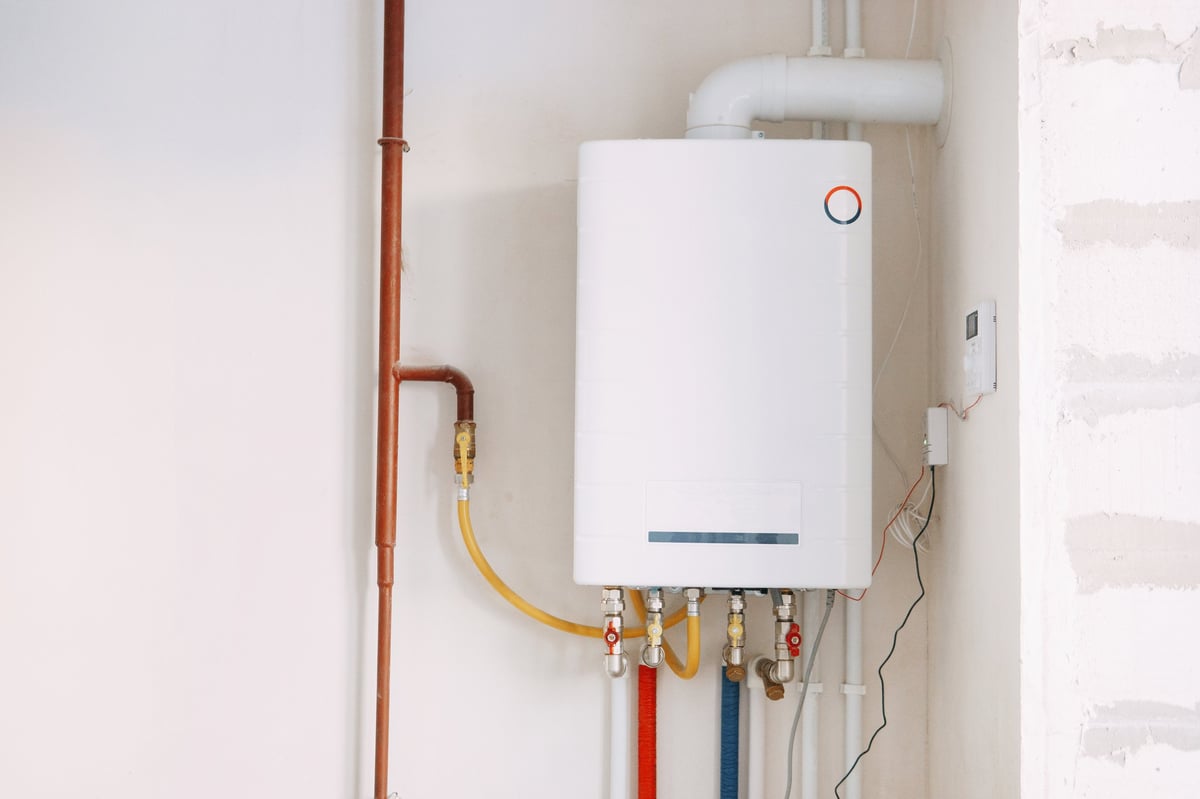 Modern tankless water heater wall mounted installation